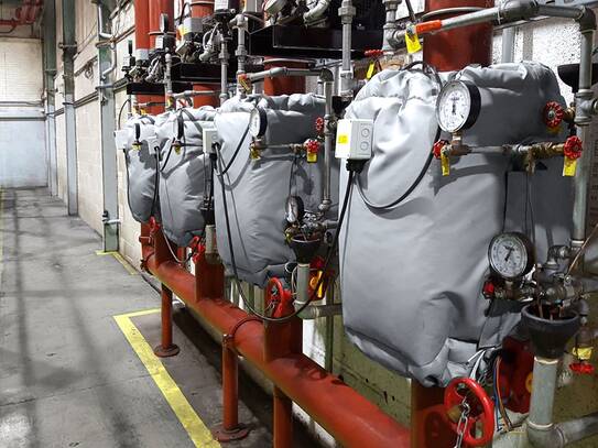 Heated jackets for frost protection of sprinkler systems